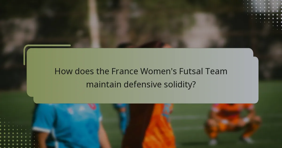 How does the France Women's Futsal Team maintain defensive solidity?